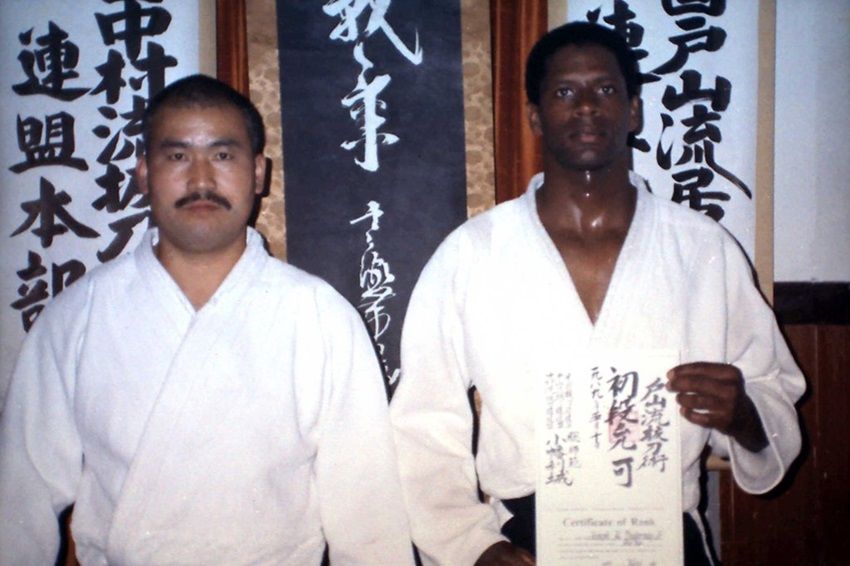 Two People Wearing Aikido Uniforms